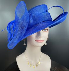 ".Fancy Medium Brim Kentucky Derby Floppy Slant Top Bucket with Flowers  Millinery Church  Hat Fabrication 100% Sinamay Style# bucket Size One size for teens and ladies, adjustable string inside can give you the best fit Head measurement  One size (55cm,  21-5/8, 6-7/8 to 57cm, 22-3/8, 7-18)  Adjustable interior tie band Brim4\" Height 4\" 💃1. All hats will be sent from Rockville, MD, 20850, using FedEx Ground (1- 5 business days if the shipping box circumference is above 263 inches, length + w Adjustable Fedora For Royal Ascot, Adjustable Brimmed Blue Top Hat, Blue Mini Hat For Beach, Adjustable Short Brim Sun Hat For Royal Ascot, Adjustable Short Brim Hats For Royal Ascot, Adjustable Blue Fedora Straw Hat, Adjustable Short Brim Hats For Races, Kentucky Derby High Crown Boater Hat, Chic Blue Hat For Formal Occasions