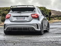 the rear end of a silver mercedes c - class