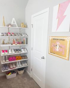 there is a closet with shoes on the shelves