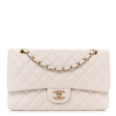 This is an authentic CHANEL Caviar Quilted Medium Double Flap in White. This stunning shoulder bag is crafted of diamond quilted luxurious caviar leather in white. The bag features polished light gold chain link leather threaded shoulder straps, a rear patch pocket, and a facing polished light gold Chanel CC turn lock. This opens to a matte white leather interior with patch pockets. Winter Purses Handbags, White Chanel Bag, New Louis Vuitton Handbags, Purse Outfit, Chanel Double Flap, Vintage Chanel Bag, Luxury Bags Collection, Latest Handbags, Chanel Flap Bag