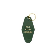 a keychain with the words keys to the commune written on it