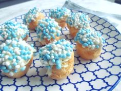 blue and white sprinkled donuts on a plate