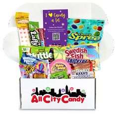 an all city candy box filled with lots of different types of candies and sweets