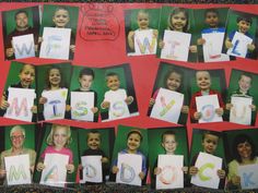 a group of children holding up pictures with the letters m and w on them in front of a red background