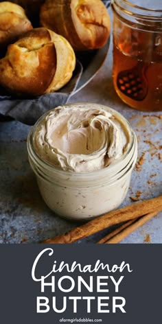 cinnamon honey butter in a glass jar next to bread