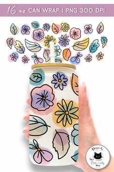 a hand holding a jar with flowers on it and the words, how to make a can