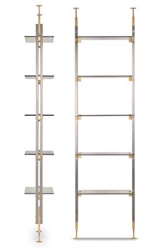 two tall metal shelves with gold trimmings, one on each side and the other on