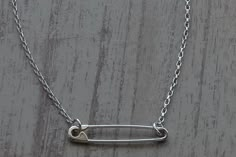 "This is a Sterling Silver Safety Pin Necklace which is 17.50 inches(44.5 cm) long.The safety pin on the necklace is 1.18 inches(3 cm) long. The weight of the necklace is 3.4gr. Please leave a note if you want diffirent length. I hallmark all the items.Here is some details of the item: Sterling Silver-Glossy finish-Hand made-925 Stamped The Sterling Silver Safety Pin Necklace is shipped in a really nice gift box. Here is some general information about Sterling Silver: Sterling silver is an alloy Safty Pin Jewelry, How To Make A Safety Pin Necklace, Safety Pins Necklace, Safety Pin Necklace, Safety Pin Bracelet, Girlfriend Necklace Gift, Girlfriend Necklace, Necklace Drawing, Safety Pin Jewelry