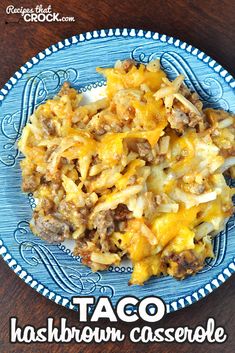 taco hashbrown casserole on a blue plate with the title above it