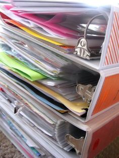 a stack of files and folders sitting on top of each other