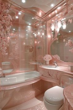 a bathroom decorated in pink and white with flowers on the wall, toilet, sink and bathtub