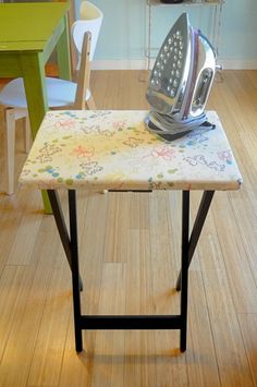 an ironing board on top of a table