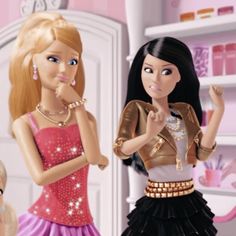 two barbie dolls standing next to each other in a pink and white room with gold accessories