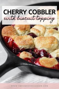 a cast iron skillet filled with berry cobbler toppings on top of a table