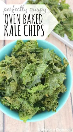 kale chips in a blue bowl with text overlay that reads perfectly crispy oven baked kale chips