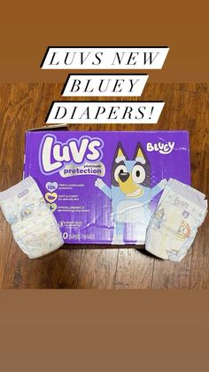 an unopened diaper sitting on top of a wooden floor