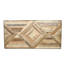 a wooden wall hanging on the side of a white wall with wood planks in it