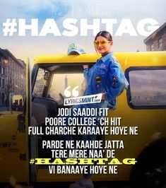 a woman standing in front of a yellow truck with the words hashtag on it