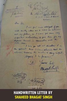 an old handwritten letter by shaeed bhagatt singh is on display