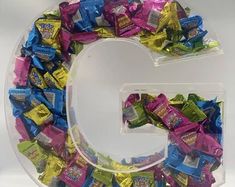 the letter g is made up of candy bars