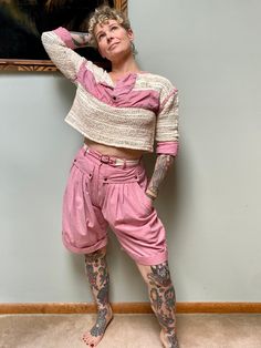 "Vintage 80's cotton crochet shorts, belt, and boxy crop top set by \"Dòna- Firenze Italy\". 100% cotton, made in Italy. This is a really cool set with lots of great details. Very well-made, even the antiqued hardware is stamped. Boxy crop top with half sleeves and henley neckline with snaps. High-waisted shorts with deep pockets and back pockets. Nylon zipper down the front with snap at waistband. Belt is made of crochet. Really nice cotton. Measurements: Marked a size 40, about a US size M and shown modeled on a 5'5\" 36/27/37 person Top: 44\" chest 13\" sleeve 16.5\" length Shorts: 27-29\" waist 13\" rise 9.5\" inseam 22\" length Condition is very good. The top was washed and dried and seems a little wonky, I'm not sure if some of it shrank? but it still looks really cool. Shorts and be Vintage Pink Cotton Shorts, Cool Shorts, Crop Top Shorts, Boxy Crop Top, Firenze Italy, Top Shorts Set, Womens Pajama, Madras Plaid, Crop Top Set