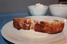 a piece of bread is sitting on a plate