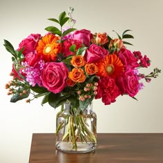 Fiesta Bouquet - DGM Flowers  | Fort Lauderdale Florist Tulips Arrangement, Online Flower Delivery, Flower Delivery Service, Vibrant Flowers, Mini Roses, Gerbera Daisy, Vibrant Flower, Pop Of Color, All Flowers