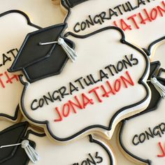 graduation cookies with congratulations written on them