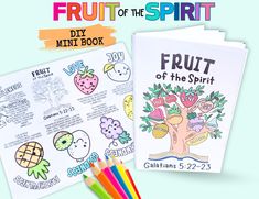 the fruit of the spirit coloring book with colored pencils and crayons on it