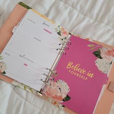 a pink planner book with flowers on it and the words, before in yourself written inside