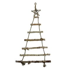 a wooden christmas tree hanging from a rope