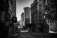 a black and white photo of a city street