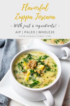 two bowls of soup with spinach, cheese and bread in them on a white plate