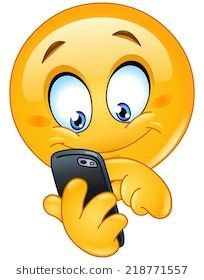 an emoticive smiley face holding a cell phone