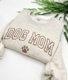 EMBROIDERED Dog Mom with paw Sweatshirt, Dog Mama Crewneck, Aesthetic Style Sweater, Dog Parent hoodie, Dog Lover Gift, Dog Gift for Women, Trendy Crewnecks for Women, Mom gifts, Mother days   The item shown in the first picture features suede brown thread on an oatmeal heather sweatshirt. 💕WELCOME TO Love Stitches Co If you are looking for soft, comfy, first-rate sweatshirts, you're in the right place! Here at Love Stitches Co, we love what we do and strive to make your shopping experience jus Crewneck Aesthetic, Dog Lover Sweatshirt, Mama Crewneck, Trendy Crewneck, Embroidered Dog, Dog Mom Sweatshirt, Dog Parents, Dog Mama, Aesthetic Style