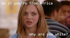 a woman with blonde hair is looking at the camera and has a caption that reads so if you're from africa, why are you white?