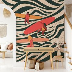 a living room with a surfboard wallpaper and wooden table in front of it