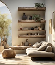 a living room filled with lots of furniture next to a window covered in plants and vases