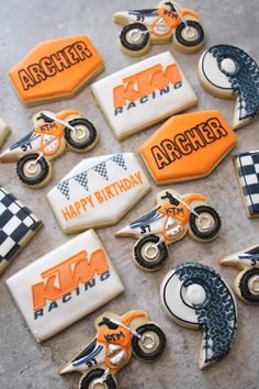 decorated cookies in the shape of motorbikes and motorcycles