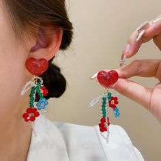 Material: Alloy Color: Silver Needle-Love Colorful Flowers Fashion Element: Flowers Style: Fashion OL Red Drop Earrings For Spring, Red Flower Earrings For Summer Party, Red Flower Shaped Jewelry For Summer, Cute Red Jewelry For Spring, Trendy Beaded Flower Earrings For Gifts, Red Flower Decorated Jewelry For Spring, Red Heart Beads Jewelry For Summer, Trendy Red Flower Earrings For Summer, Cute Red Earrings For Spring