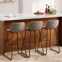 Presenting our 26/30 inch bar stools counter height - the perfect blend of comfort, style, and durability. These modern bar stools set for kitchen island are designed to make your kitchen island or bar area even better. Experience the luxury and comfort of counter height bar stools with backs. With a seat height of 26/30 inches, a cushioned backrest, and a footrest, these counter height bar chairs set provide a comfortable sitting position for long periods. leather counter height bar stools are Leather Counter Height Bar Stools, 30 Inch Bar Stools, Stools For Kitchen, Counter Stools With Backs, Western Kitchen, Stools For Kitchen Island, Bar Stools With Backs, Counter Height Chairs, Bar Height Stools