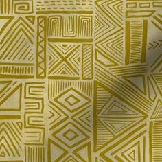 a yellow and white wallpaper with geometric designs