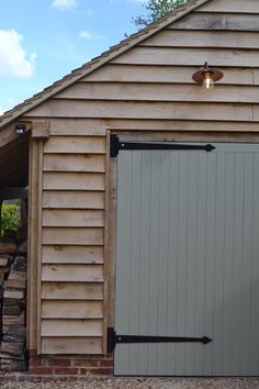 a garage with an open door on the side