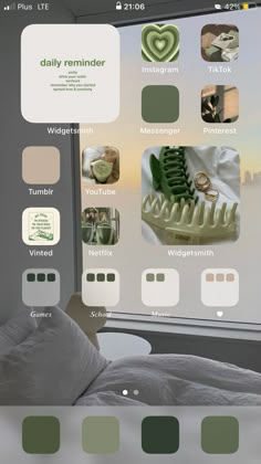 an image of a bed with many different things on the screen and in front of it