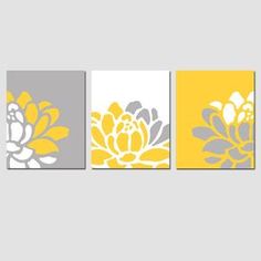 three yellow and gray flower paintings on white canvases, each with an individual's name