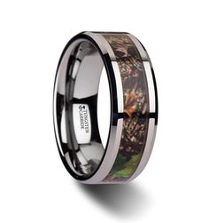 a wedding ring with camouflage inlaying the center and black plated steel inside