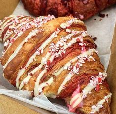 a pastry with white icing and candy canes on it