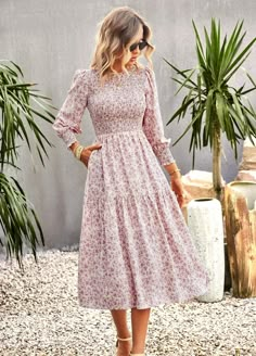 Femme meets fancy in the Trading Places Floral Midi Dress in crepe pink base that features a flowy skirt. Size Guide: Tina is 5’65” tall, and has a 33.6” bust, 24.1” waist, & 35.2” hips. She is wearing a S / US 4 / AU 8. This dress is true to size. Material: 100% Viscose. Feature: High neckline. Midi length. Smocke Long Dress Casual Summer, Trading Places, Cute Modest Outfits, Summer Chic, Modest Fashion Outfits, Maxi Dresses Casual, Casual Summer Dresses, Outfit Casual, Floral Midi Dress