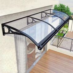 an image of a balcony with glass railing