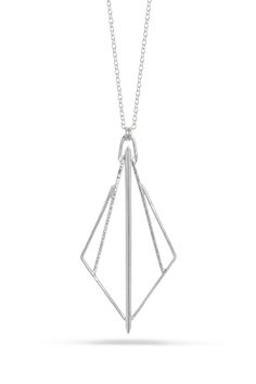 Gold & Silver Necklace - Get ready to turn heads with this statement necklace, boasting a geometric pendant with a stunning combination of gentle curves and sharp angles. The sturdy rhombus frame encases an inverted diamond, creating a unique contrast of high arches and points. Lobster clasp closure. Luxury Geometric Silver Jewelry, Elegant Triangle Sterling Silver Jewelry, Elegant Sterling Silver Triangle Jewelry, Modern Silver Geometric Necklace, Silver Triangle Metal Necklace, Geometric Necklace, Geometric Pendant, Precious Metals, Silver Gold